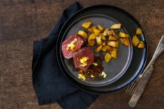 Chateaubriand steak with curry and orange butter