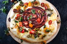 Pizza “snail” with tomato vinaigrette