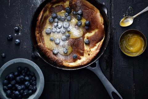 Dutch baby pancakes with passion fruit curd