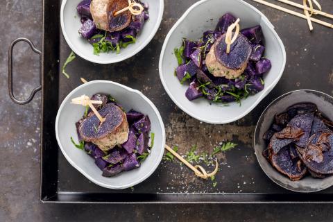 Purple potato salad with meatballs