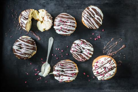 Chocolate and vanilla crème doughnuts