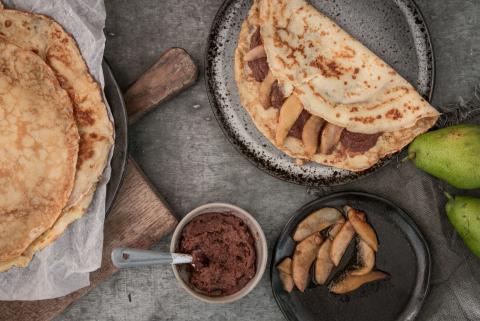 Pancakes with chocolate cream and pears