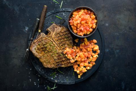 T-bone steak with papaya salsa