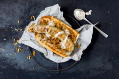 Grilled bratwurst hot dog with beer sauerkraut
