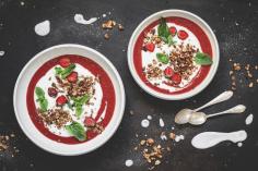 Coconut yoghurt with strawberry puree and a nut crunch