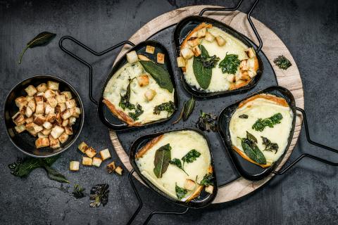 Raclette with herbs and garlic croutons
