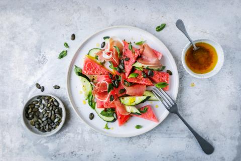Watermelon and cucumber salad with cured ham