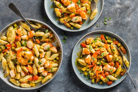Ricotta gnocchi with prawns and vegetables