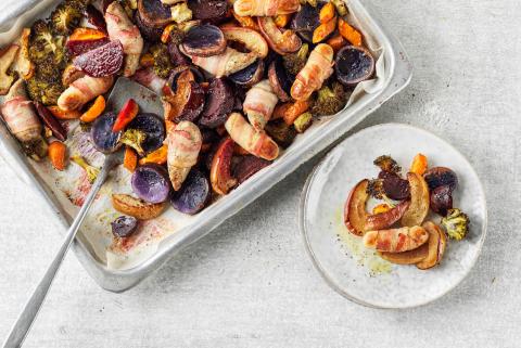 Oven-baked sausages and vegetables