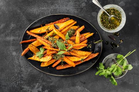 Roasted sweet potatoes and carrots with sesame seeds
