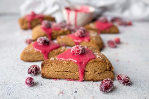 Vegan gingerbread scones with cranberry frosting