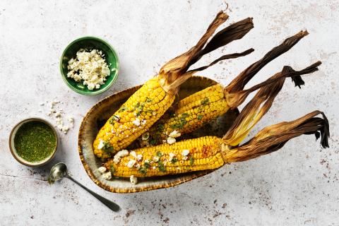 Grilled corn on the cob with coriander salsa