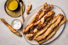 Cheese twists with salami and herbs