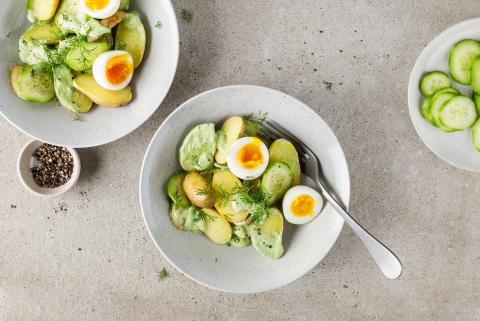 Potato and egg salad with green dressing 