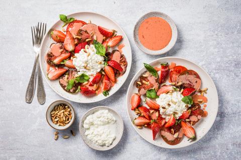 Cottage cheese and tomato salad with strawberries