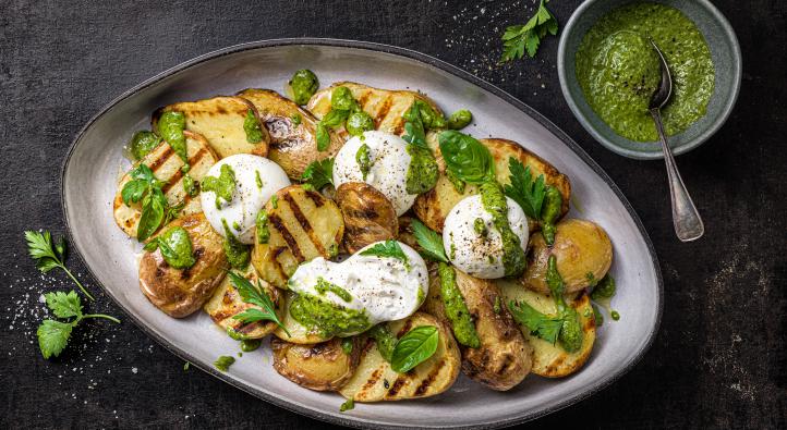 Grilled potatoes with pesto and burrata
