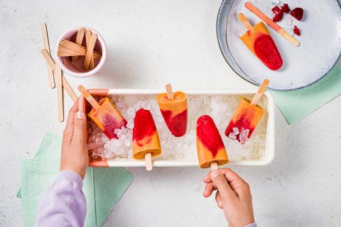 Raspberry and apricot ice lollies