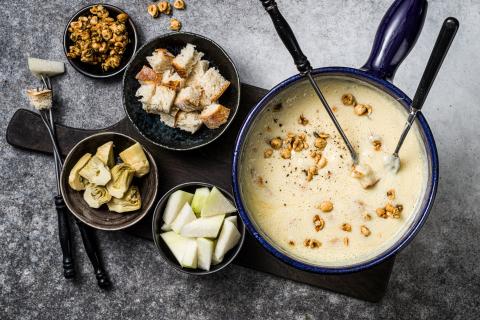 Fondue with hazelnut and thyme topping