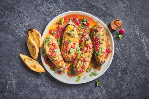 Grilled aubergine with harissa and raspberry vinaigrette