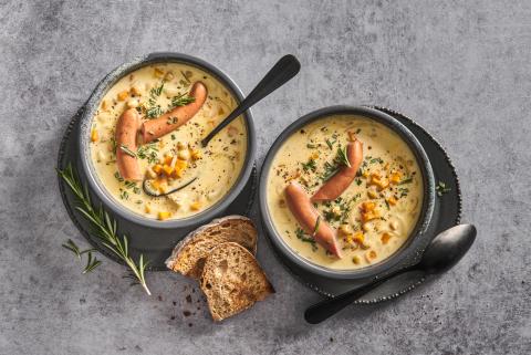 White wine soup with frankfurter sausages