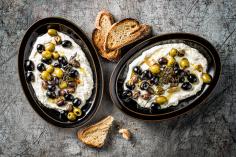 Braised olives with mozzarella cream