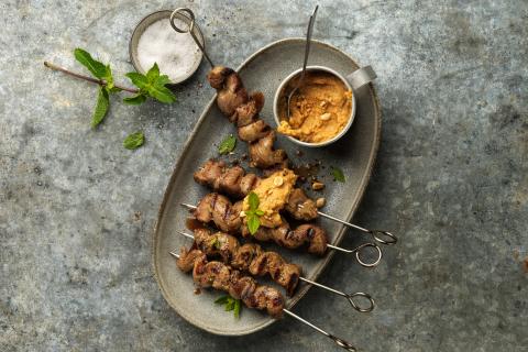 Grilled lamb skewers with peanut sauce