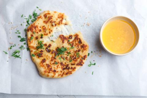 Cheesy naan with garlic butter