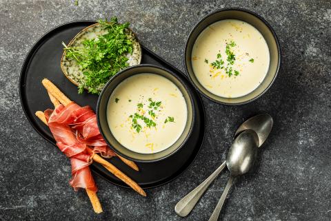 Parmesan foam soup with cured ham 