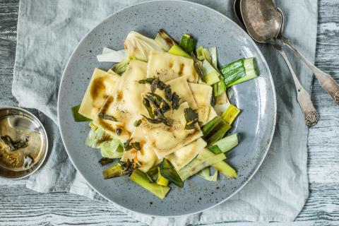 Agnolotti pasta with soft goats' cheese and orange sauce