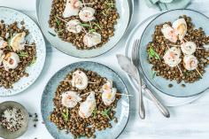 Fish rolls on a bed of balsamic lentils