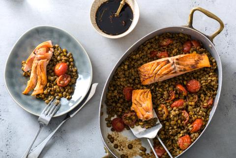 Sweet and sour salmon fillets on a bed of lentils