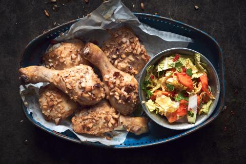 Chicken with a coconut crust and papaya salad