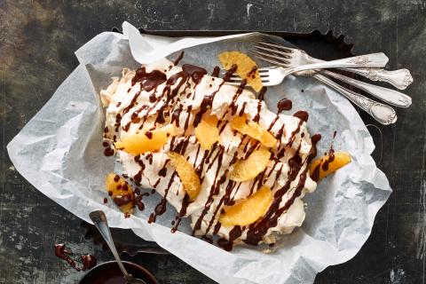 Pavlova with chocolate and orange topping