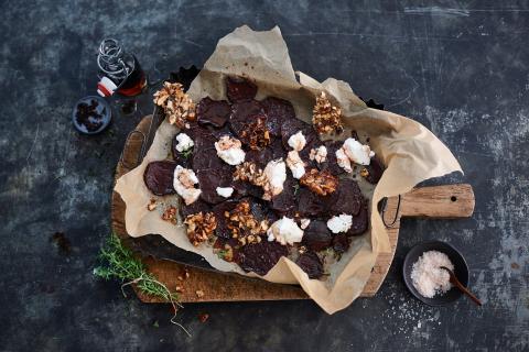 Baked beetroot slices with hazelnut and allspice brittle