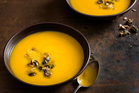 Pumpkin soup with orange and spicy seeds