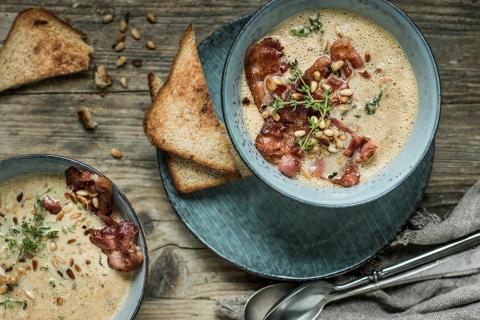 Cream of mushroom soup with tomatoes and bacon