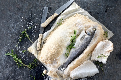 Salt-crusted sea bass