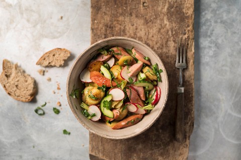 Cervelat sausage and potato bowl