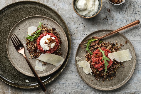 Steak tartare on a bed of quinoa
