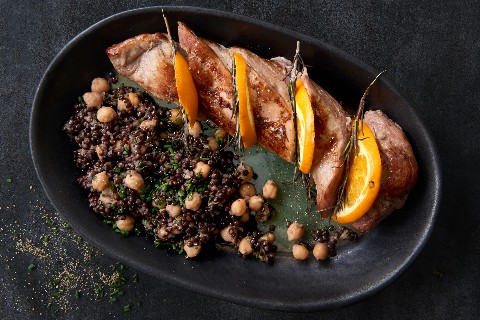 Pork fillet with beluga lentil salad