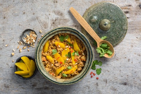 Rice dish with oranges and chicken