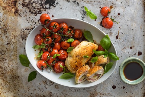 Stuffed chicken breast with melted tomatoes