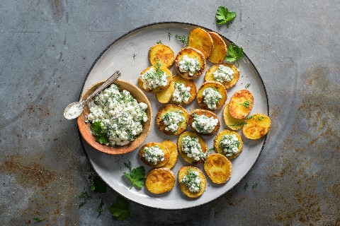 Potato slices with cottage cheese salad