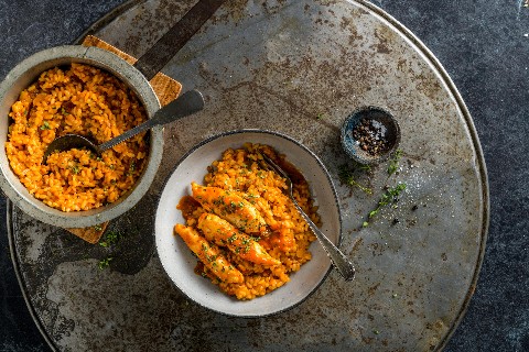 Spicy chicken fillets with tomato risotto