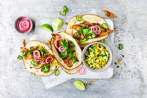 Planted chicken tacos with corn and cucumber salsa