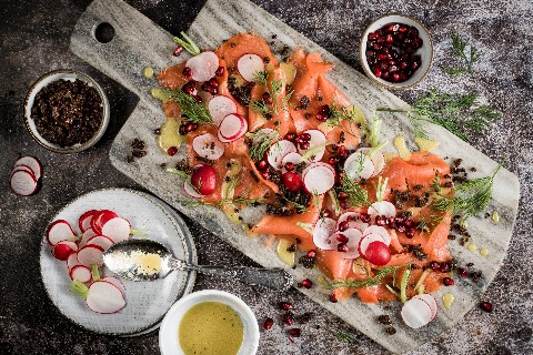 Smoked salmon carpaccio with pomegranate
