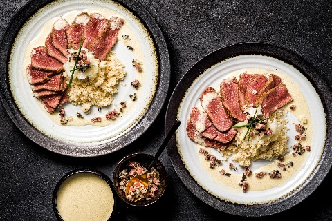 Beef fillet on a bed of caramelized cauliflower couscous