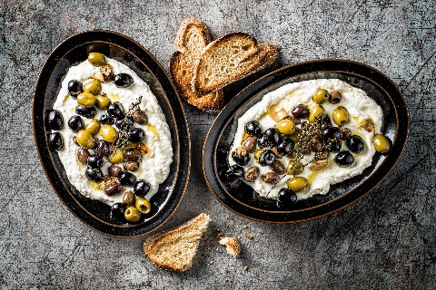 Braised olives with mozzarella cream
