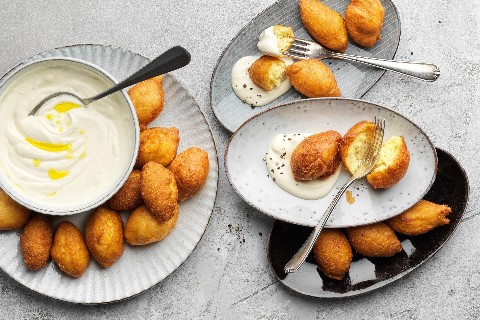 Pommes dauphine con dip al tartufo