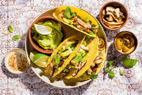 Tacos con funghi e guacamole
